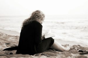 Lady on beach dealing with obesity