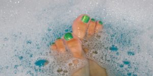 Lady painted toes in bath Comfort Yourself